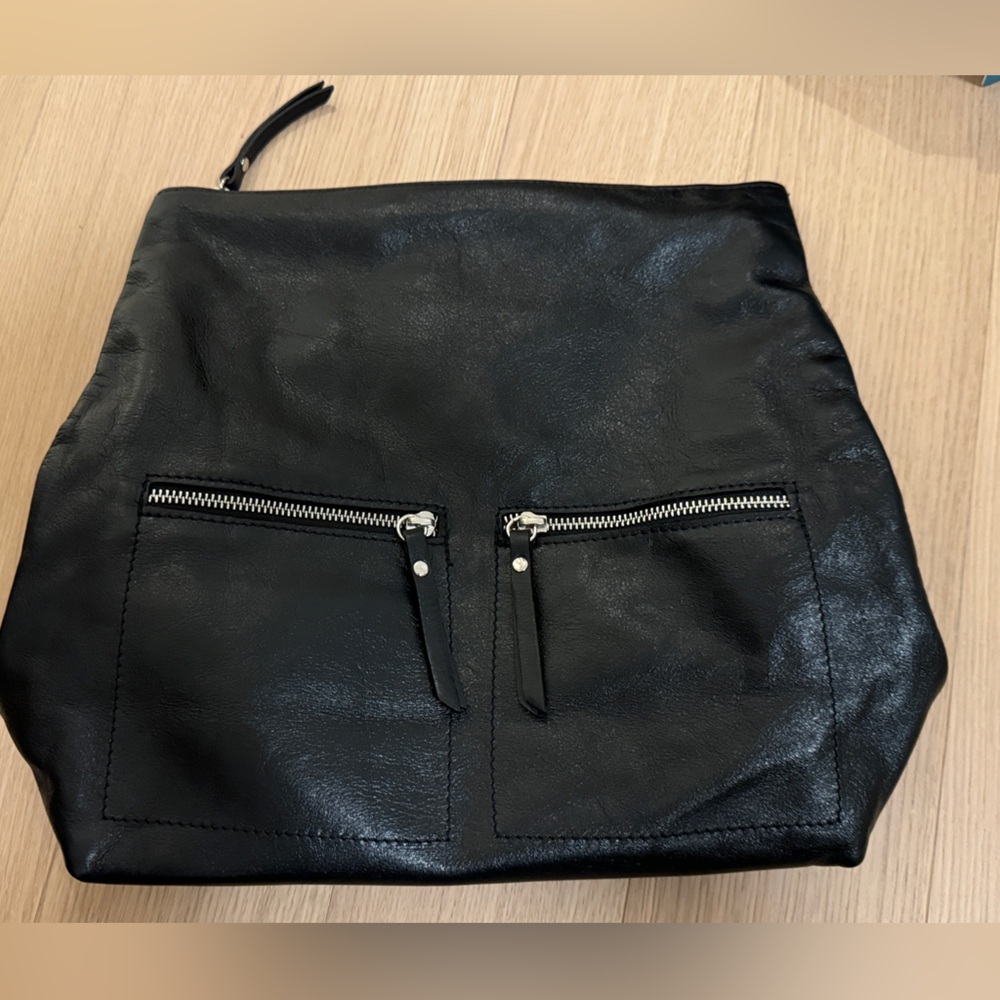 Neiman Marcus Italian-made Black leather backpack, adjustable straps, medium